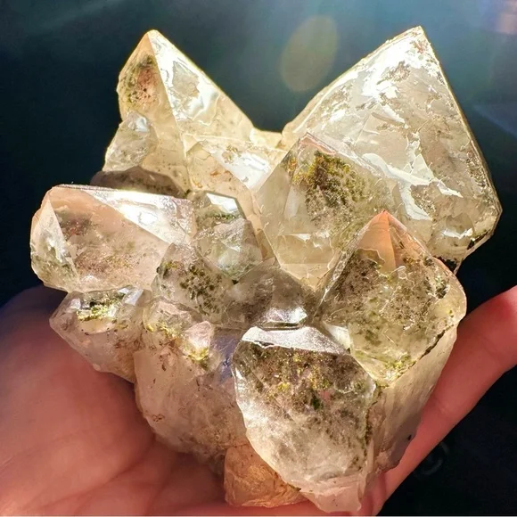 Large quartz, amethyst, and epidote combo with phantoms terminations red quartz